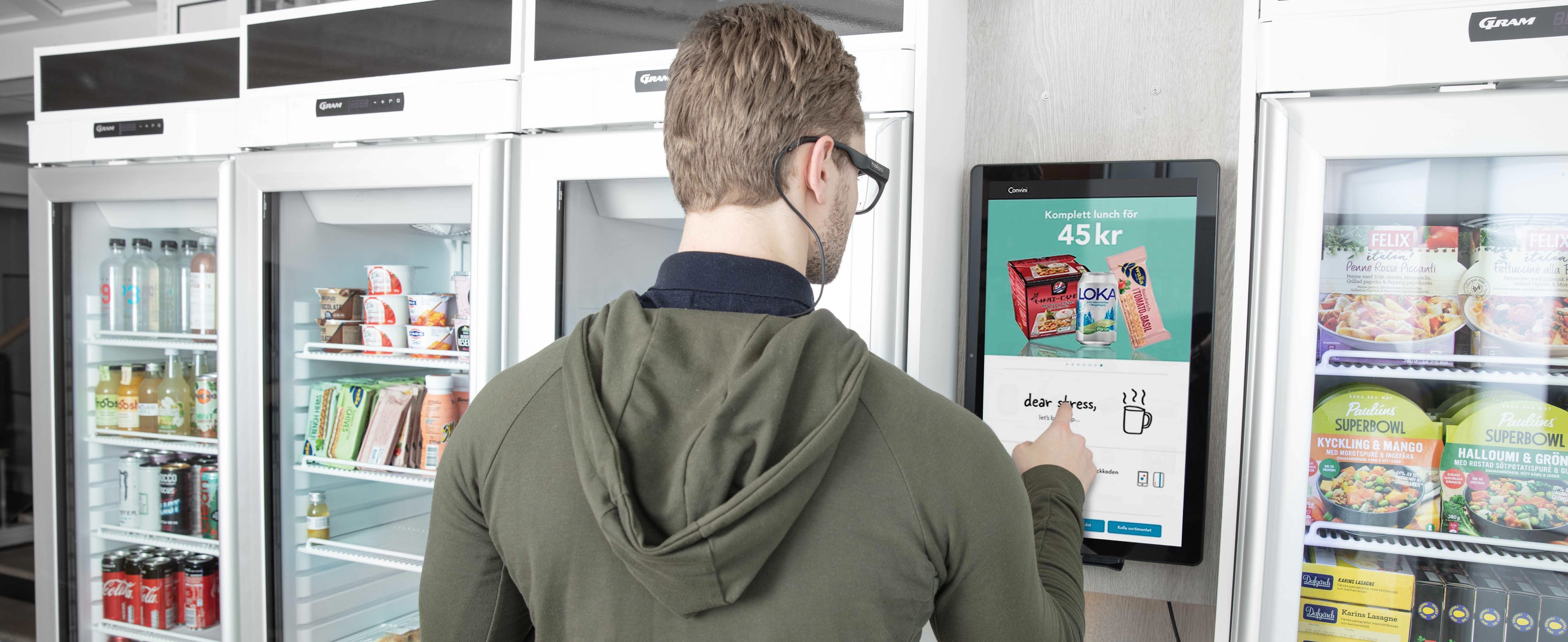 Man wearing Glasses 3 to purchase vending machine food