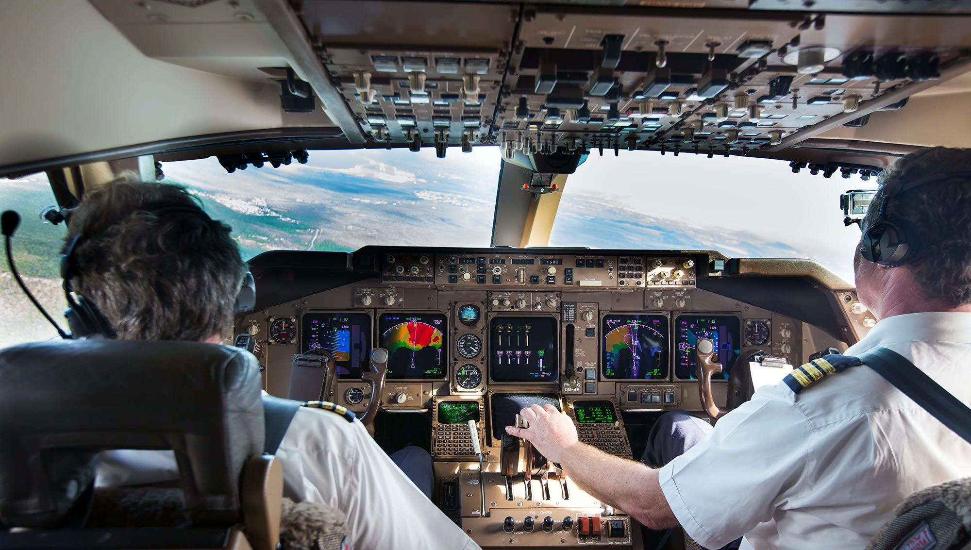 2 pilots in a cockpit